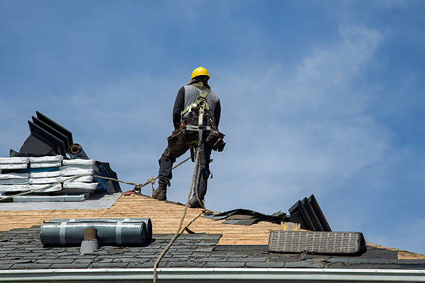 Professional Gutter Installation technician working in West Burke, VT